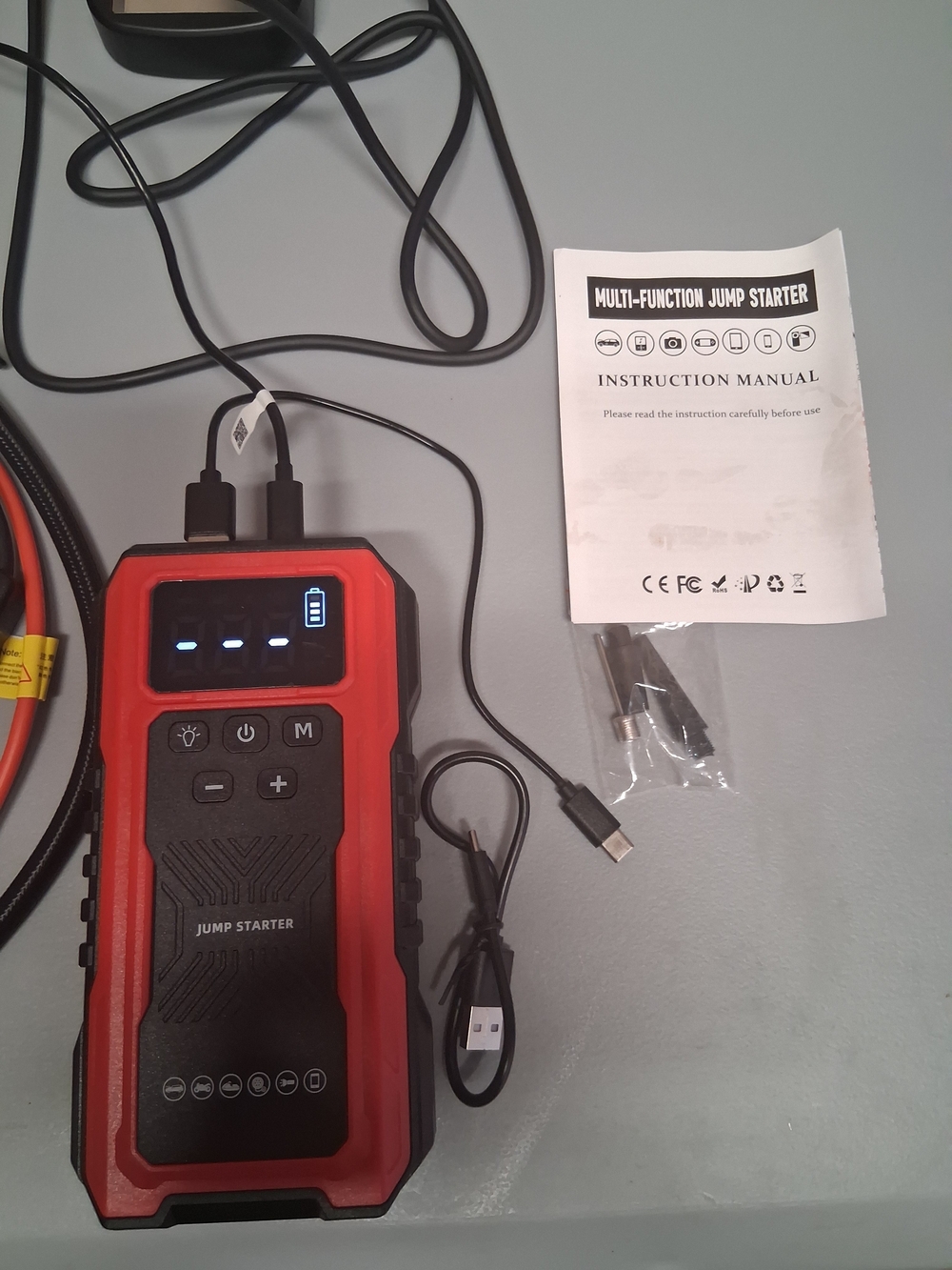 18000 Amp, 200 PSI Portable Red and Black Multi-Function Jump Starter